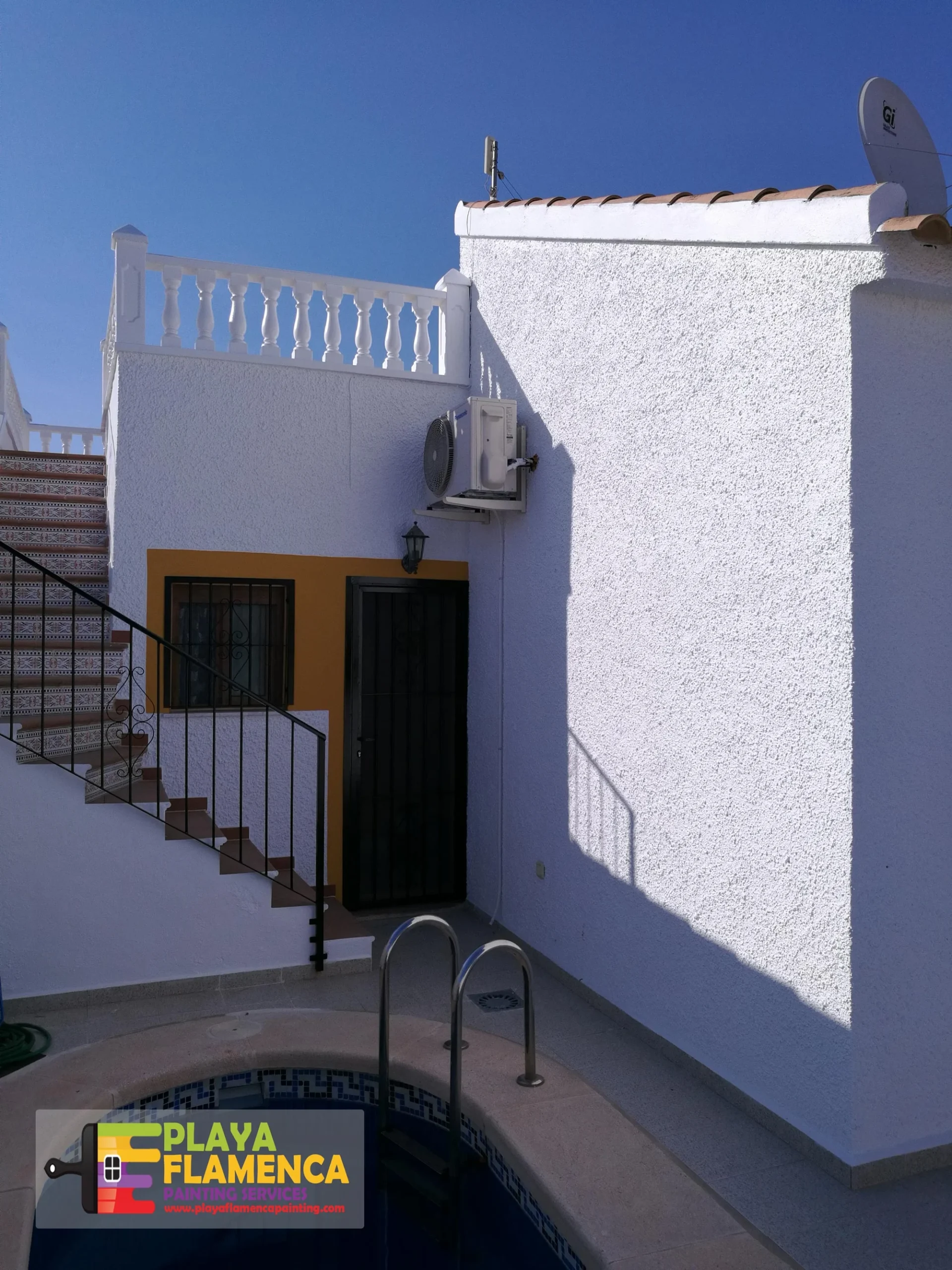 Full villa exterior, including gates and balustrades — after painting