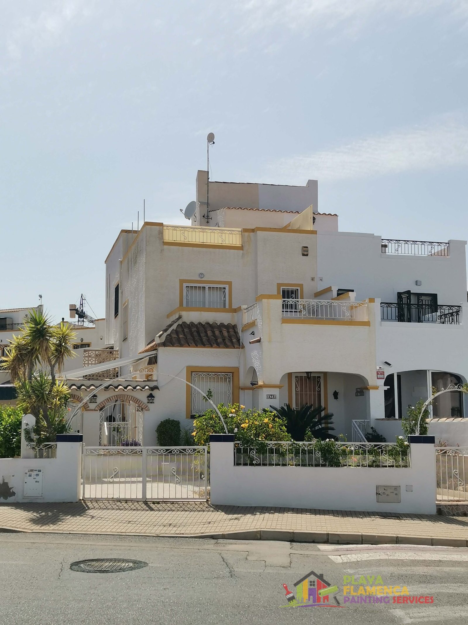 Full villa exterior, including gates and balustrades — before painting